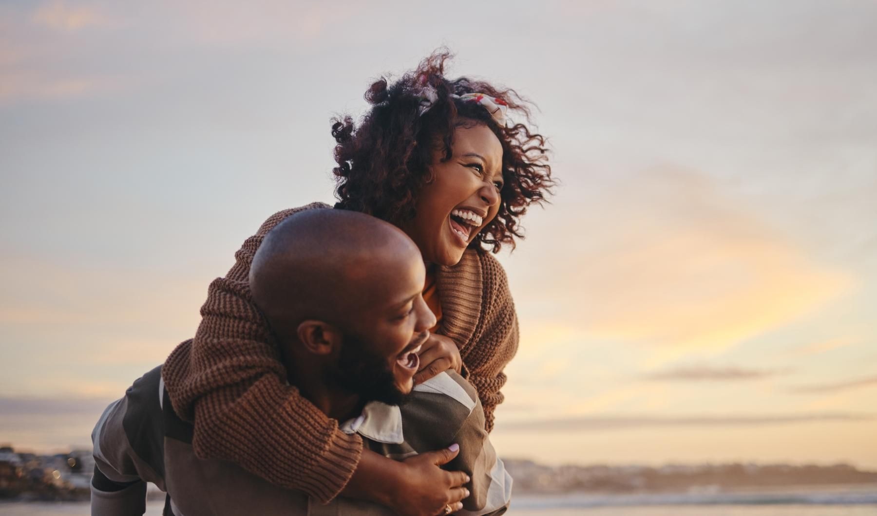 a woman and a man laughing